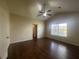 Bedroom with wood floor, ceiling fan, and window at 76 Daisy Meadow Trl, Lawrenceville, GA 30044