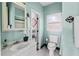 Charming bathroom with vanity and matching wall color at 240 Melrose Ave, Decatur, GA 30030