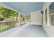 Spacious wrap around front porch featuring beautiful blue ceilings and floors at 240 Melrose Ave, Decatur, GA 30030