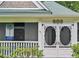 Elegant front porch with beautiful ornate screen doors and vintage house marker at 240 Melrose Ave, Decatur, GA 30030