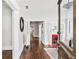 Inviting hallway with gleaming hardwood floors leading to the living areas at 240 Melrose Ave, Decatur, GA 30030
