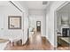 Bright hallway with hardwood floors offering views to other rooms in the house at 240 Melrose Ave, Decatur, GA 30030