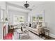 Bright living room with stylish furnishings, fireplace, and coffered ceiling at 240 Melrose Ave, Decatur, GA 30030