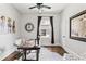 Spacious home office with stylish lighting and a large window at 240 Melrose Ave, Decatur, GA 30030