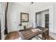 Home office featuring wood floors, desk and natural light at 240 Melrose Ave, Decatur, GA 30030