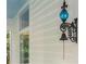 Unique wrought iron and glass ornate light fixture featured on the front porch at 240 Melrose Ave, Decatur, GA 30030
