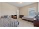 Spacious bedroom with two twin beds, neutral decor and ample natural light at 2629 Muskeg Sw Ct, Atlanta, GA 30331