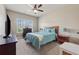 Well-lit bedroom with a large window, comfortable queen-sized bed and neutral decor at 2629 Muskeg Sw Ct, Atlanta, GA 30331