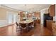 Open kitchen features a central island, stainless steel appliances and hardwood flooring at 2629 Muskeg Sw Ct, Atlanta, GA 30331