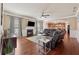 Spacious living room featuring a fireplace, hardwood floors, and an open layout at 2629 Muskeg Sw Ct, Atlanta, GA 30331