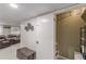 Finished basement area with plush seating, movie-themed decor, and ample room for entertainment at 7234 Post Rd, Winston, GA 30187