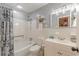 Bathroom featuring white tile, shower-tub, and classic vanity at 7234 Post Rd, Winston, GA 30187
