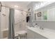 Bright bathroom with updated fixtures, accessible shower, and modern vanity at 7234 Post Rd, Winston, GA 30187