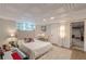 Finished basement bedroom offers a comfortable sleeping space with tile flooring and an egress window at 7234 Post Rd, Winston, GA 30187