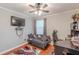 The bedroom offers a cozy seating area and a dedicated workspace, perfect for relaxation and productivity at 7234 Post Rd, Winston, GA 30187
