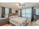 Comfortable bedroom featuring natural light and a queen bed at 7234 Post Rd, Winston, GA 30187