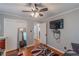 Bedroom with wood floors, closet, and an entertainment setup, offering convenience and style at 7234 Post Rd, Winston, GA 30187