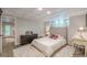 Basement bedroom featuring neutral colors, a tile floor and a doorway to a larger entertaining space at 7234 Post Rd, Winston, GA 30187