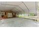 Spacious carport has brick accents and offers ample covered parking and outdoor entertaining area at 7234 Post Rd, Winston, GA 30187