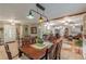 Cozy dining area features hardwood floors, natural light, and a stylish dining table at 7234 Post Rd, Winston, GA 30187