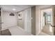 Basement hallway with access to various rooms and storage, complemented by neutral-toned walls at 7234 Post Rd, Winston, GA 30187