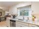 Kitchen area with stainless steel dishwasher and ample counter space at 7234 Post Rd, Winston, GA 30187