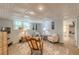 Bright living area with comfortable seating, a textured ceiling, and natural light from the backyard windows at 7234 Post Rd, Winston, GA 30187