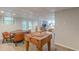 Basement open floor plan with dining area, kitchen, and living room at 7234 Post Rd, Winston, GA 30187