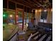Comfortable screened porch with cozy seating, a bar, and outdoor views of the pool at 7234 Post Rd, Winston, GA 30187