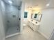 Bathroom features a new tile shower, new vanity and modern fixtures at 876 Pinehurst Sw Ter, Atlanta, GA 30310