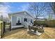 Backyard patio with seating and fire pit on a well-maintained lot at 1057 Fortress Sw Ave, Atlanta, GA 30315