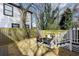 Cozy backyard patio with seating surrounded by wood fence at 1057 Fortress Sw Ave, Atlanta, GA 30315