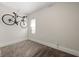 Clean bedroom with bike rack and neutral carpet at 1057 Fortress Sw Ave, Atlanta, GA 30315