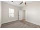 Bedroom with plush carpet, window, and ensuite access at 1057 Fortress Sw Ave, Atlanta, GA 30315
