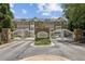 Cobblestone at Brookhaven, an upscale townhome community with brick architecture and gated entrance at 1986 Cobblestone Ne Cir, Atlanta, GA 30319