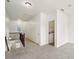 Bright upstairs hallway leads to a laundry room with modern appliances, and features a staircase at 1986 Cobblestone Ne Cir, Atlanta, GA 30319