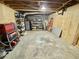 Unfinished basement area suitable for a workshop or additional storage at 3975 N Sharon Church N Rd, Loganville, GA 30052