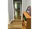 Inviting hallway with wood-look flooring, fresh paint, and classic trim, creating a warm and welcoming entrance at 3975 N Sharon Church N Rd, Loganville, GA 30052