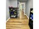 Hallway with durable flooring, leading to another room and convenient storage options at 3975 N Sharon Church N Rd, Loganville, GA 30052
