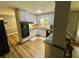 Well-lit kitchen with updated appliances and fixtures at 3975 N Sharon Church N Rd, Loganville, GA 30052