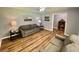 Comfortable living room with wood floors and neutral gray color scheme at 3975 N Sharon Church N Rd, Loganville, GA 30052