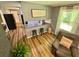 Charming living room features wood floors, an open layout, and natural light at 3975 N Sharon Church N Rd, Loganville, GA 30052
