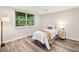 Bedroom featuring a queen size bed and bright natural light at 526 Summer Ter, Woodstock, GA 30189