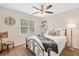 Cozy bedroom with window and comfortable bed at 526 Summer Ter, Woodstock, GA 30189