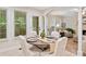 Bright eat-in kitchen with large windows and an arched doorway to the living room at 526 Summer Ter, Woodstock, GA 30189