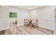 Small dining area with wood flooring, table with seating for two at 526 Summer Ter, Woodstock, GA 30189