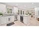 Gourmet kitchen with stainless steel appliances, granite counters, and tiled floors at 526 Summer Ter, Woodstock, GA 30189