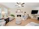Bright living room featuring a fireplace, neutral tones, and stylish decor at 526 Summer Ter, Woodstock, GA 30189