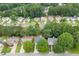 Scenic aerial view showcasing the neighborhood's lush trees and well-maintained homes at 571 Oak Vista Ct, Lawrenceville, GA 30044