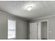 Neutral bedroom with carpet and window with blinds at 571 Oak Vista Ct, Lawrenceville, GA 30044